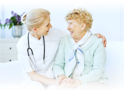 a nurse tapping the back of the elder lady