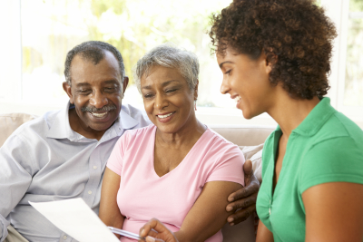 Seniors talking with adult woman