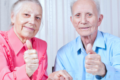 seniors showing thumbs up