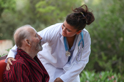 smiling doctor with senior man